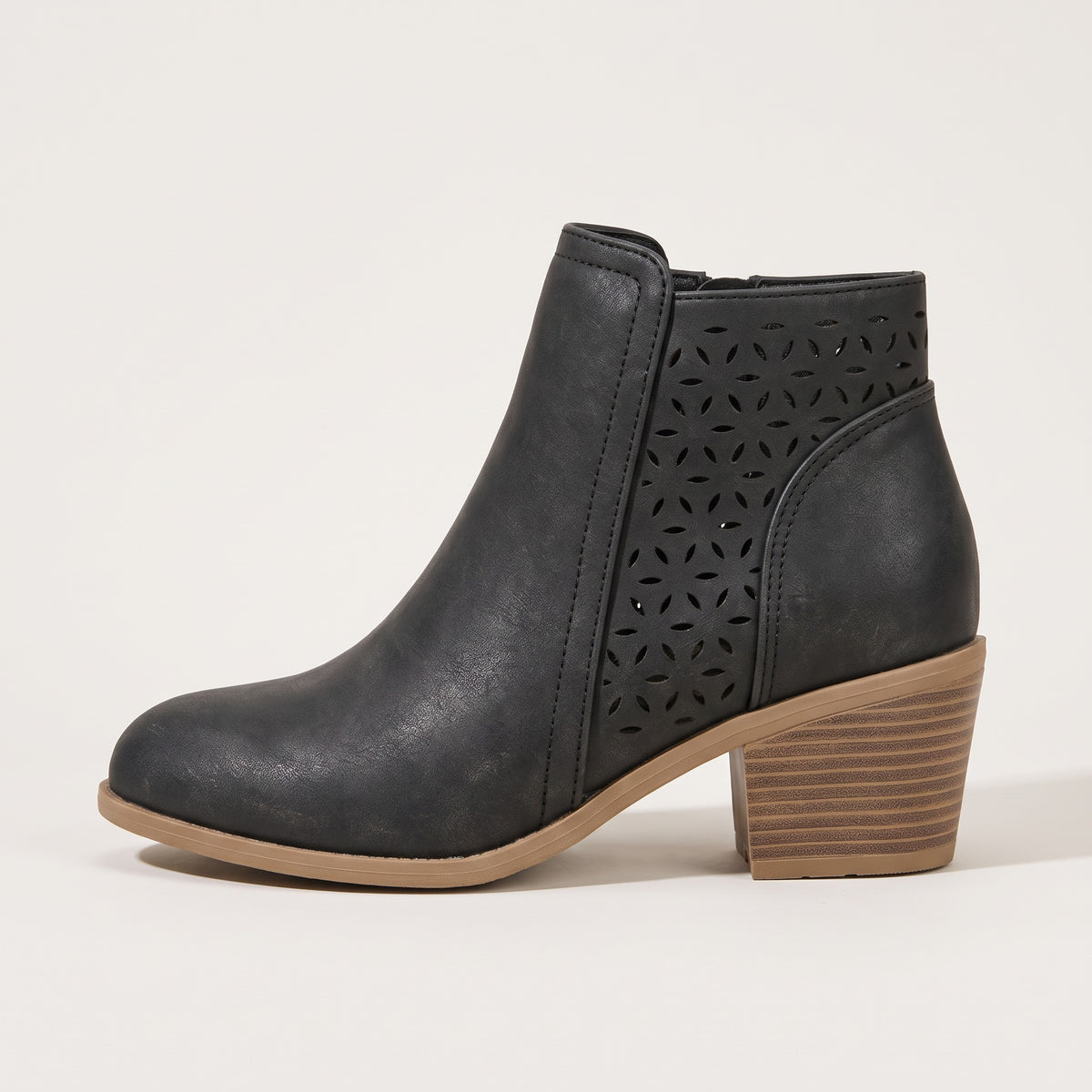Women's cutout ankle boots in black, side view