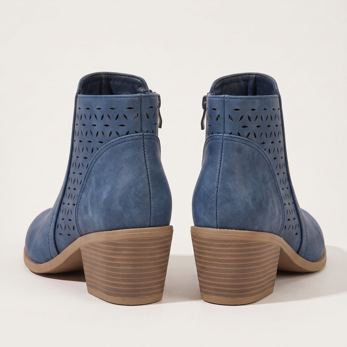 Women's cutout ankle boots in blue, back view