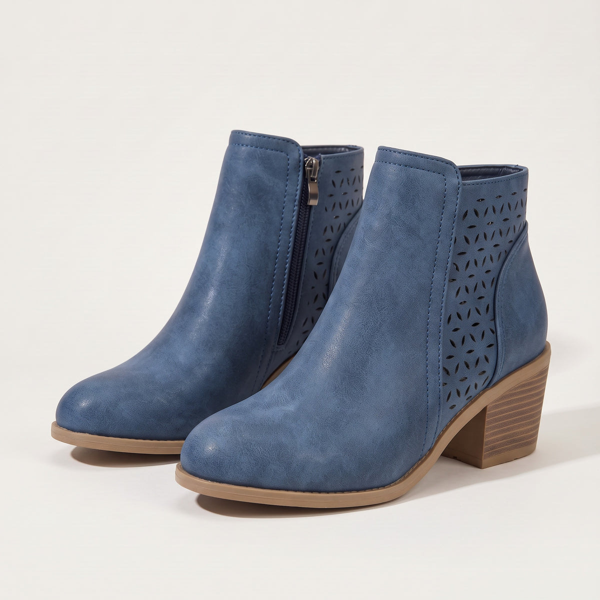 Women's cutout ankle boots in blue, front view