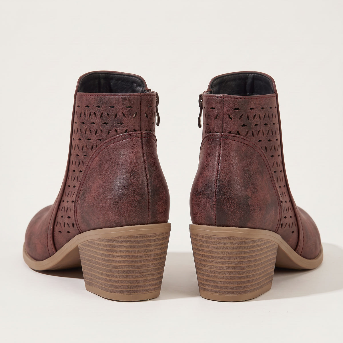 Women's cutout ankle boots in maroon, back view
