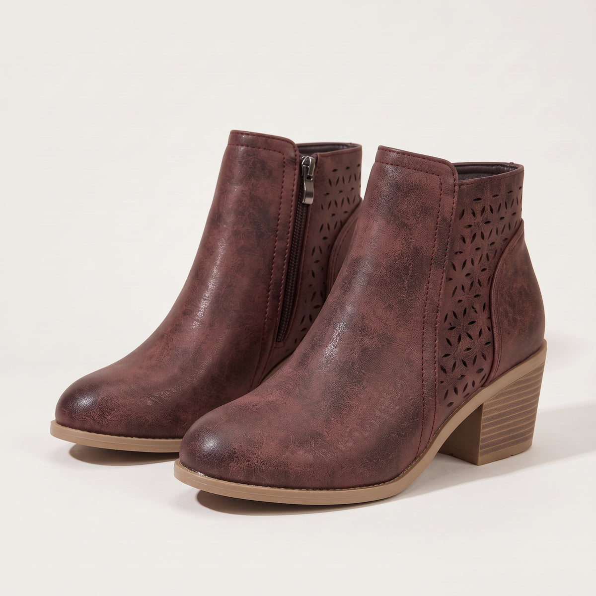 Women's cutout ankle boots in maroon, front view