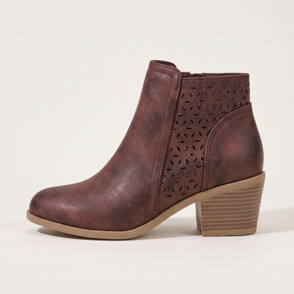 Women's cutout ankle boots in maroon, side view
